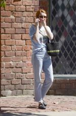 EMMA ROBERTS Shows off Her New Bright Red Locks Out in Los Angeles 04/10/2025