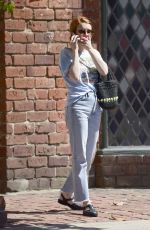 EMMA ROBERTS Shows off Her New Bright Red Locks Out in Los Angeles 04/10/2025
