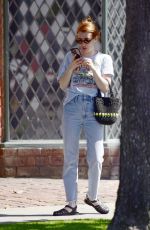 EMMA ROBERTS Shows off Her New Bright Red Locks Out in Los Angeles 04/10/2025