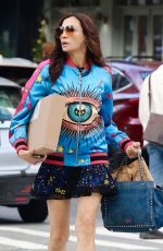 FAMKE JANSSEN Out on a Windy Day in New York City 04/15/2025