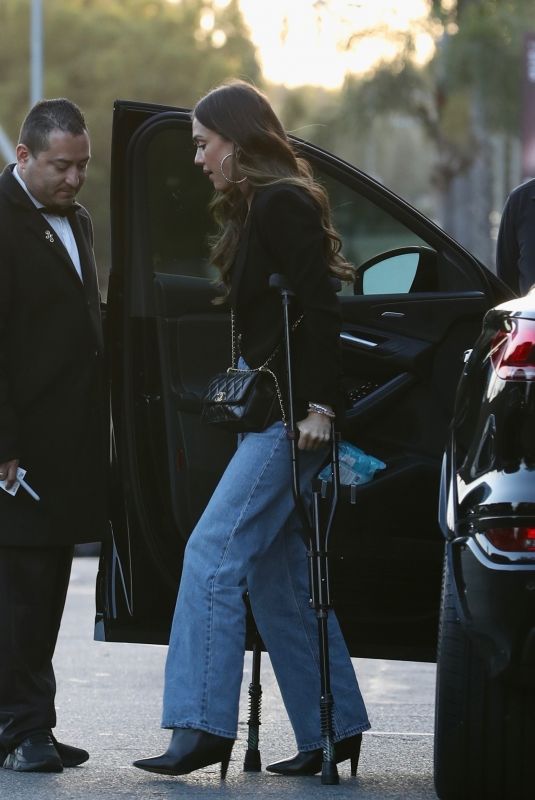 JESSICA ALBA Leaves on Crutches from The Bird Streets Club with a Friend in Los Angeles 04/15/2025