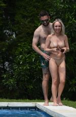 JORGIE PORTER in in Bikini at Poolside in Spain, April 2025