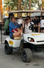 KATE HUDSON Opts for a Golf Cart Ride at Coachella 04/13/2025