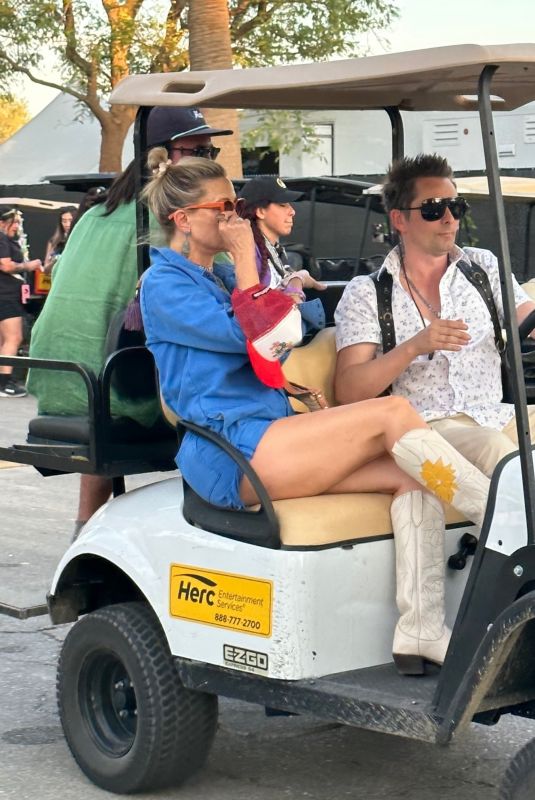 KATE HUDSON Opts for a Golf Cart Ride at Coachella 04/13/2025