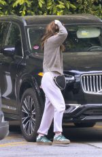 KATE MARA Checks Tire Pressure at a Gas Station in Los Angeles 04/28/2025
