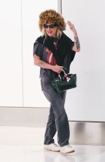 KESHA Arrives at LAX Airport in Los Angeles 04/13/2025