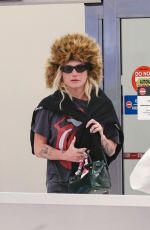KESHA Arrives at LAX Airport in Los Angeles 04/13/2025