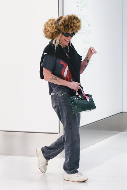 KESHA Arrives at LAX Airport in Los Angeles 04/13/2025