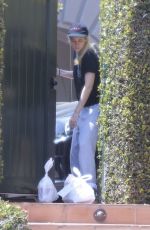 KRISTEN STEWART Picking up Her Uber Eats Delivery at Her Home in Los Feliz 04/22/2025