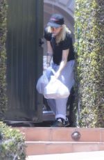 KRISTEN STEWART Picking up Her Uber Eats Delivery at Her Home in Los Feliz 04/22/2025