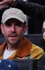 LILY COLLINS at NBA Game Between LA Lakers and Houston Rockets in Los Angeles 03/31/2025