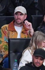LILY COLLINS at NBA Game Between LA Lakers and Houston Rockets in Los Angeles 03/31/2025
