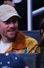 LILY COLLINS at NBA Game Between LA Lakers and Houston Rockets in Los Angeles 03/31/2025