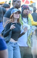 MADELAINE PETSCH Out at Disneyland in Anaheim 04/20/2025