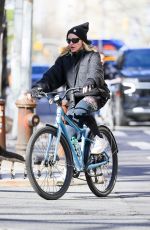 MADONNA Out Riding a Biking Around Central Park in New York City 04/10/2025