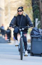MADONNA Out Riding a Biking Around Central Park in New York City 04/10/2025