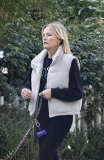 MALIN AKERMAN Out for a Walk with Her Dog 04/24/2025