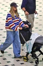 MARGOT ROBBIE Arrives at Brisbane Airport in Australia 04/15/2025