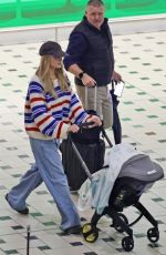 MARGOT ROBBIE Arrives at Brisbane Airport in Australia 04/15/2025