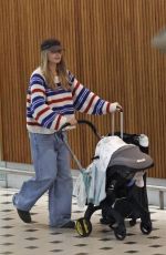 MARGOT ROBBIE Arrives at Brisbane Airport in Australia 04/15/2025