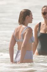 MARGOT ROBBIE in Bikini at a Beach on Gold Coast 04/19/2025