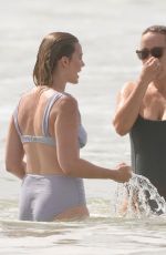 MARGOT ROBBIE in Bikini at a Beach on Gold Coast 04/19/2025