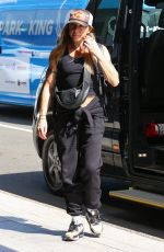 MELANIE CHISHOLM and Chris Dingwall Departing Sydney Airport 04/14/2025