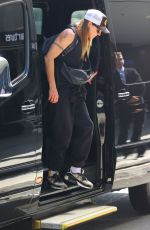 MELANIE CHISHOLM and Chris Dingwall Departing Sydney Airport 04/14/2025