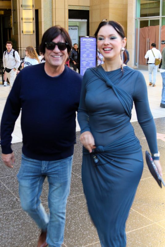 NATASHA and Martin BLASICK Arrives at The Accountant Premiere in Hollywood 04/17/2025