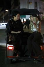 ROSE Shares a Laugh with a Friend on Golf Cart After Coachella 04/13/2025
