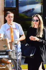 ANGELINA JOLIE Out Shopping with Her Son Knox at Lazy Acres in Los Angeles 05/01/2025