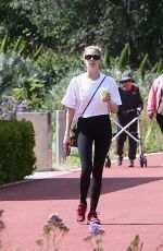 ASHLEY BENSON and Brandon Davis Out with Their Dog in Beverly Hills 05/14/2025