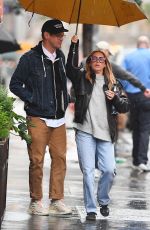 ASHLEY TISDALE and Christopher French Rnjoy a Rainy Dinner Date in New York 05/28/2025