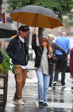 ASHLEY TISDALE and Christopher French Rnjoy a Rainy Dinner Date in New York 05/28/2025