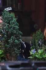 ASHLEY TISDALE and Christopher French Rnjoy a Rainy Dinner Date in New York 05/28/2025