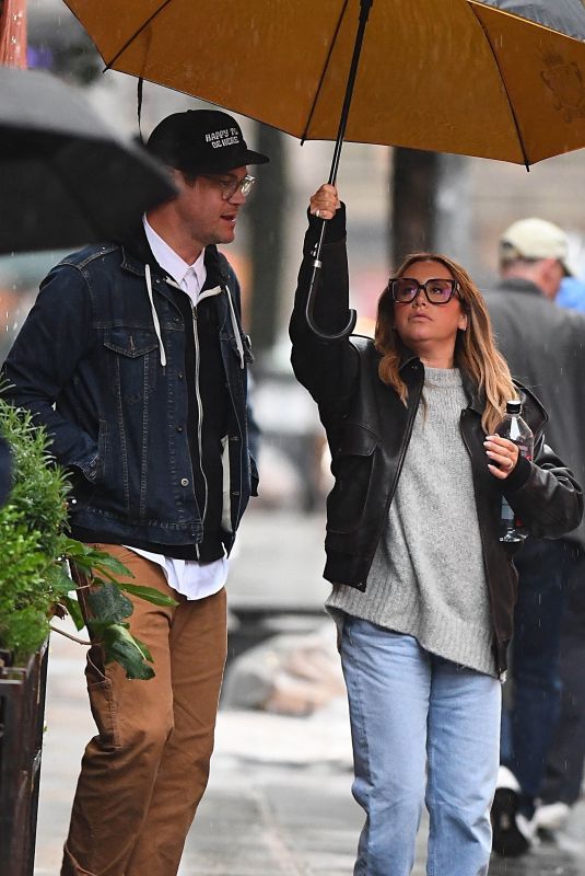 ASHLEY TISDALE and Christopher French Rnjoy a Rainy Dinner Date in New York 05/28/2025