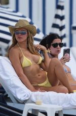 BROOKS NADER in a Yellow Bikini to the Beach in Miami 05/07/2025