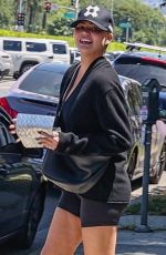 CHRISSY TEIGEN in Tight Shorts Out in Los Angeles 05/20/2025