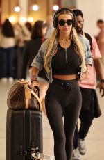 CHRISTINE MCGUINNESS Landing Back in UK After Quitting New Series of Celebs Go Dating 05/02/2025
