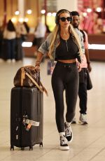 CHRISTINE MCGUINNESS Landing Back in UK After Quitting New Series of Celebs Go Dating 05/02/2025