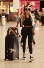 CHRISTINE MCGUINNESS Landing Back in UK After Quitting New Series of Celebs Go Dating 05/02/2025