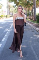 CLAIRE HOLT Out on Croisette at 78th Cannes Film Festival in Cannes 05/17/2025
