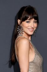 DAKOTA JOHNSON at Kering Women in Motion at 78th Cannes Film Festival 05/18/2025