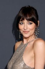 DAKOTA JOHNSON at Kering Women in Motion at 78th Cannes Film Festival 05/18/2025