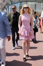 ELLE FANNING in a Chanel Dress Out on Croisette in Cannes 05/21/2025