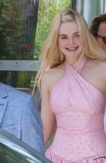 ELLE FANNING in a Chanel Dress Out on Croisette in Cannes 05/21/2025
