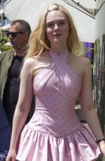 ELLE FANNING in a Chanel Dress Out on Croisette in Cannes 05/21/2025