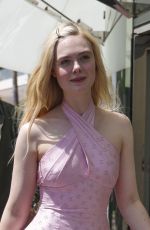 ELLE FANNING in a Chanel Dress Out on Croisette in Cannes 05/21/2025