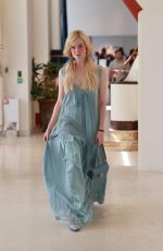ELLE FANNING Out and About in Cannes 05/21/2025