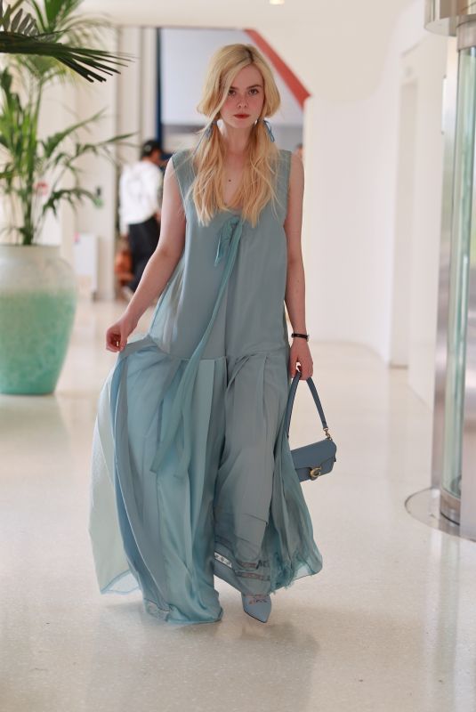 ELLE FANNING Out and About in Cannes 05/21/2025